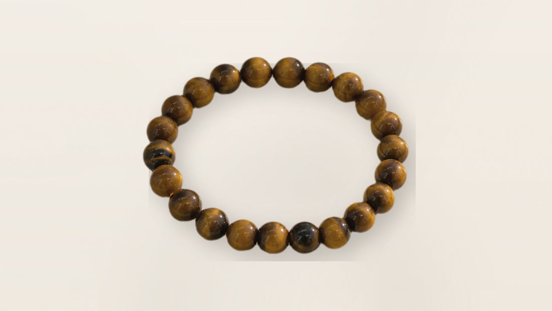 Tiger's Eye Crystal Guide: Meaning, Benefits, and Uses for Grounding and Focus crystal guide cover