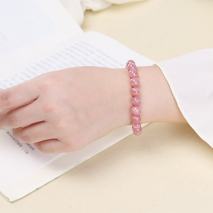 Rhodochrosite Bracelet – Compassionate Courage | Lumina Quartz - wearing